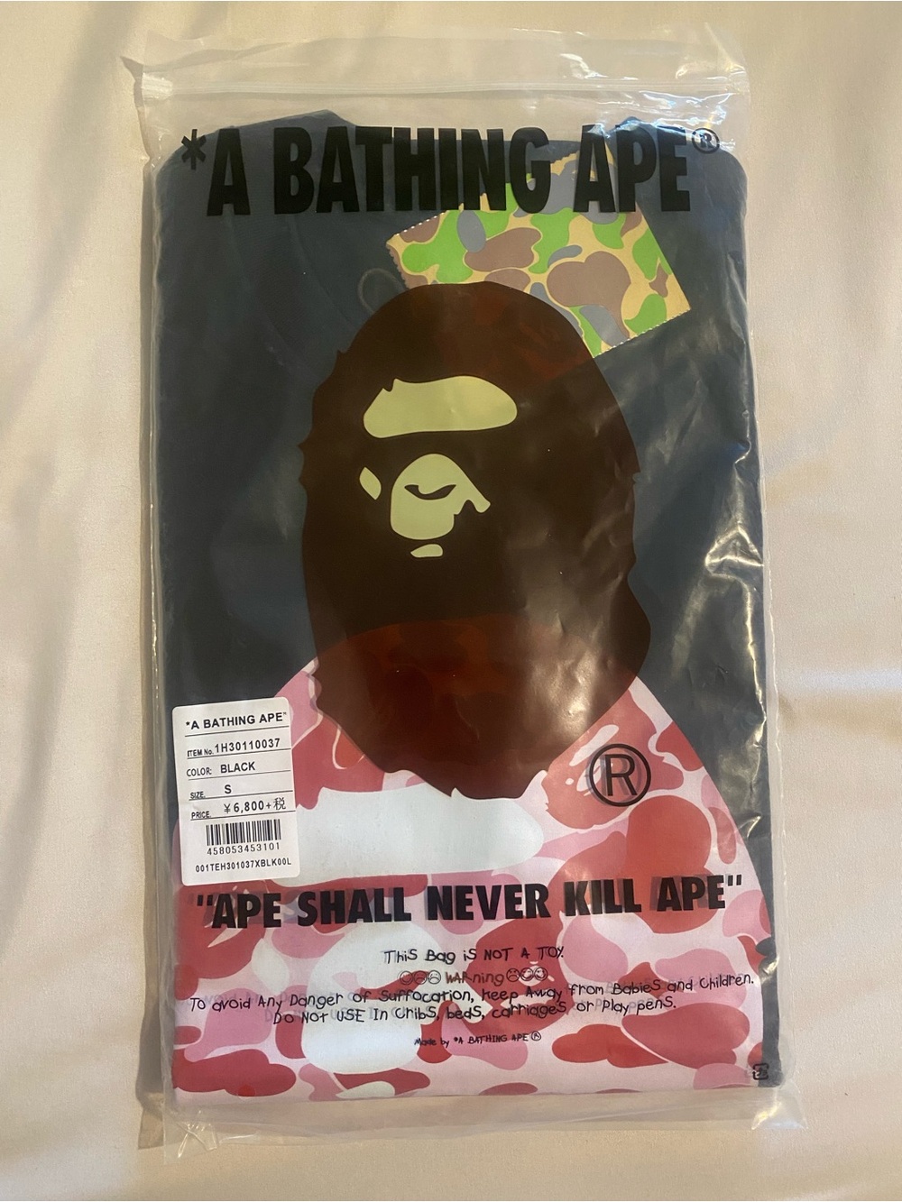 A Bathing Ape Kids Black Graphic Tee with Camouflage Ape Print